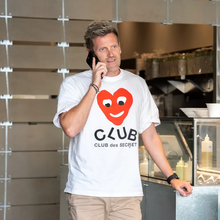 Green Cup co-founder Simon Guest talking on mobile phone